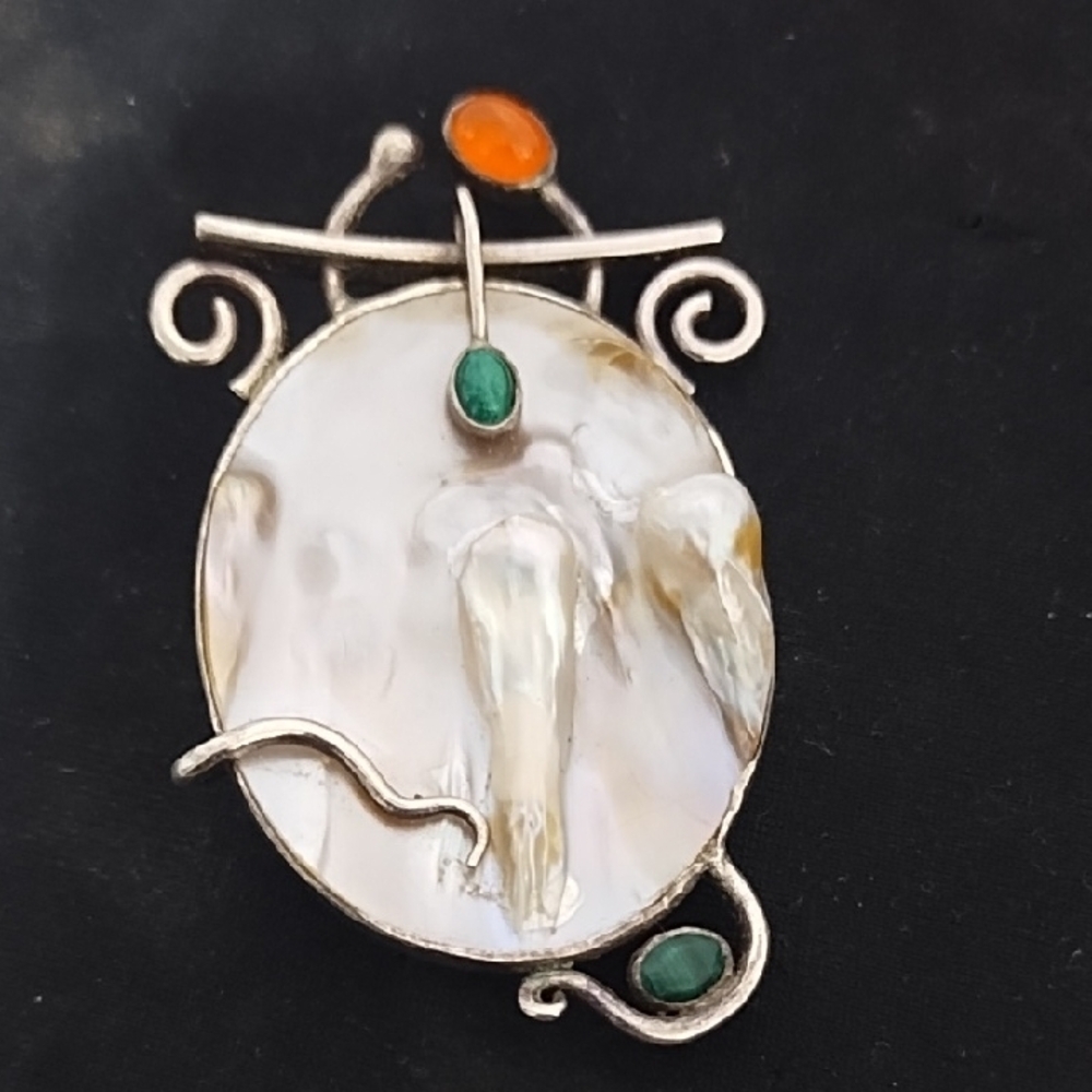 Elegant Silver and Orange Brooch